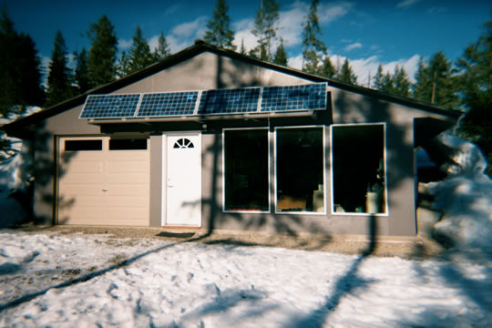 Earth sheltered, energy efficient, solar powered home
